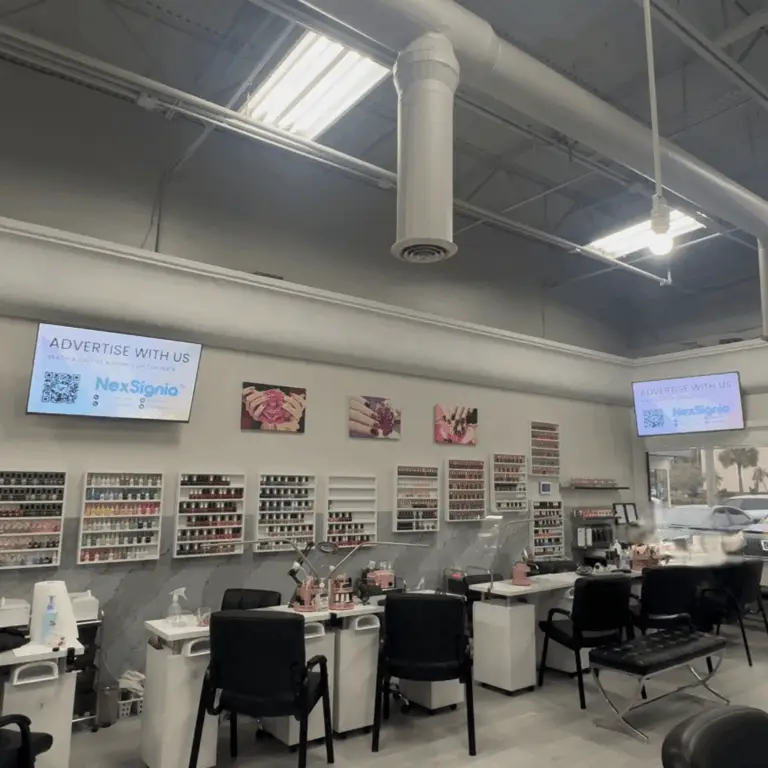 Local business advertising screen inside a premium beauty salon