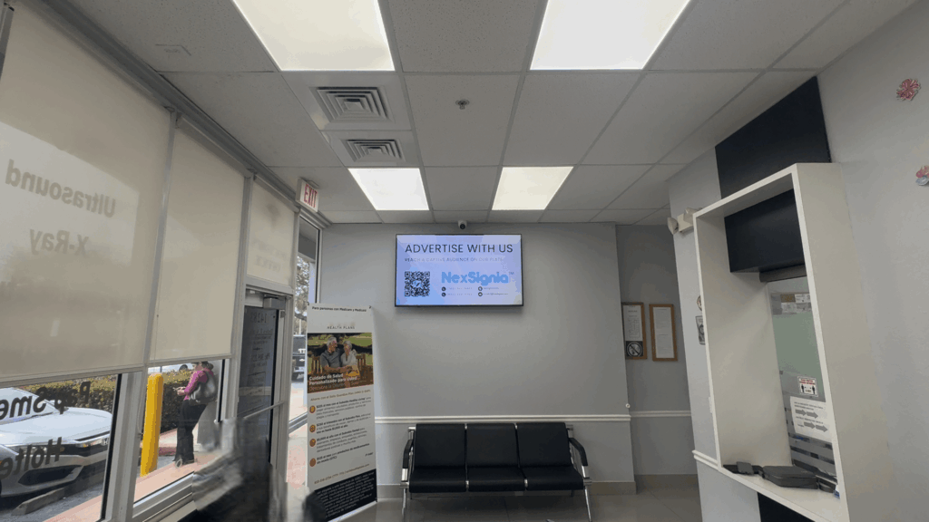 NexSignia digital signage screen in a medical clinic waiting room
