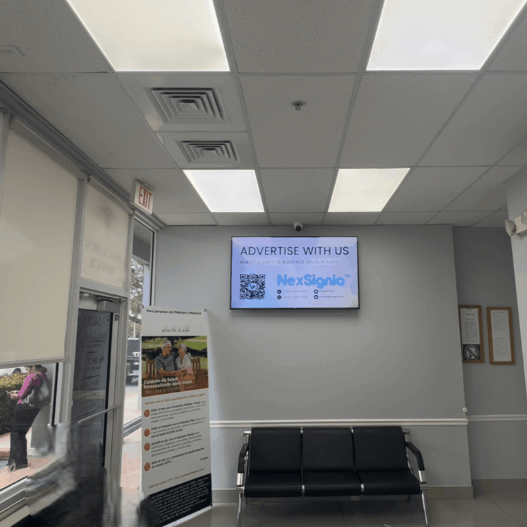 NexSignia digital signage screen in a medical clinic waiting room